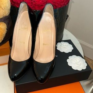 Authentic black patent leather Christian Louboutin heel